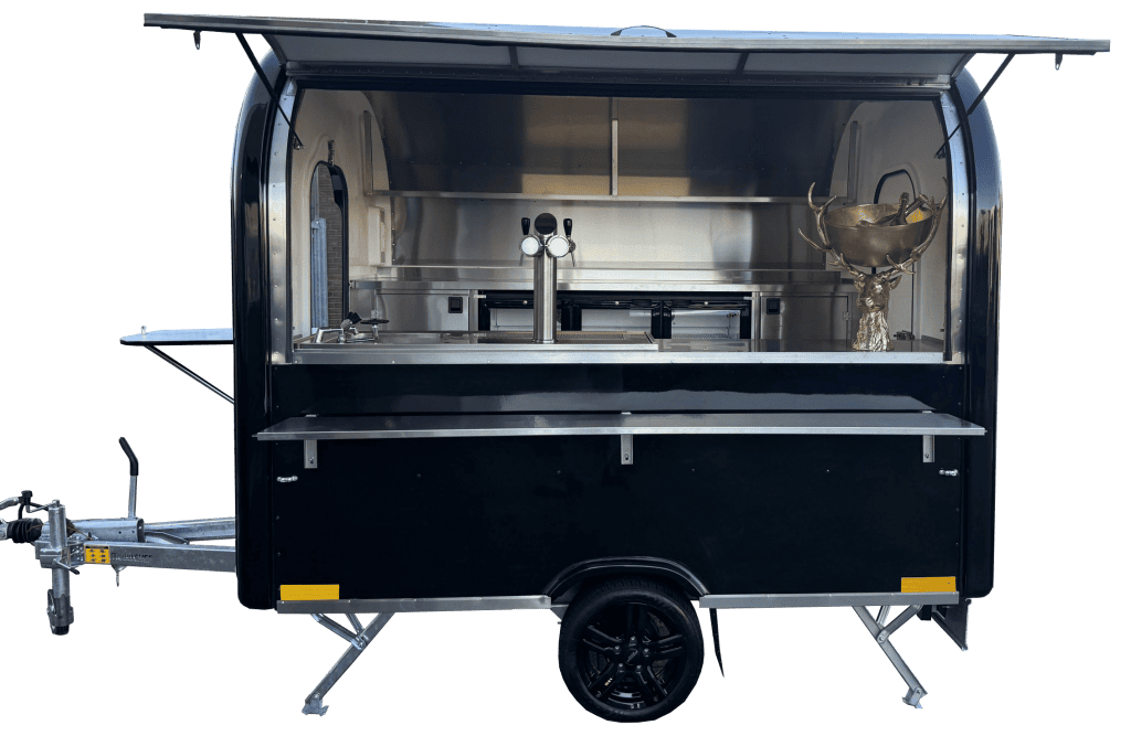 Mobiele foodtruck voor catering en evenementen, perfect voor buitenbarbecues en Horeca.